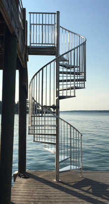 aluminum checkerplate spiral staircase on deck in alabama